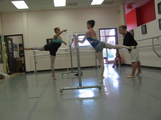 Mom, a master teacher and former ballerina, also worked some at the school when her busy schedule permitted.  Here she is seen working with one of her students who now dances professionally, and one of mine.