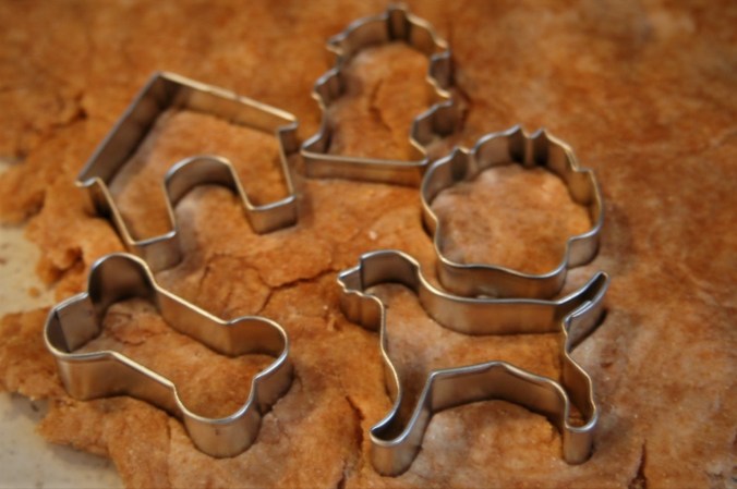 Dog biscuit cookie cutters in rolled dough